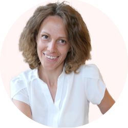 Annegret Bertsch ECPC headshot photo, light haired woman wearing a white short sleeved top smiling