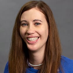 Headshot of Lisa Cunningham, ICF staff member with the International Coaching Federation.