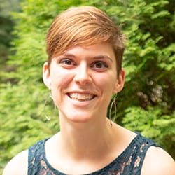 Jessica Grove PCC headshot photo, smiling woman with short blond hair outside