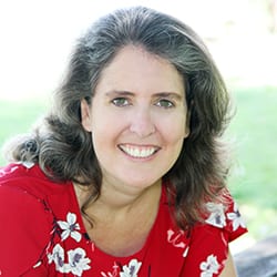 Marianne Bateup PCC headshot photo, smiling woman with red top