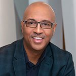 Headshot of Melvin Smith. Known for coaching with compassion and expertise in lifelong learning and growth.