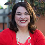 Headshot of Cristina Custodio, MCC with the International Coaching Federation. Known for coaching social leaders in education, philanthropy, and community development.