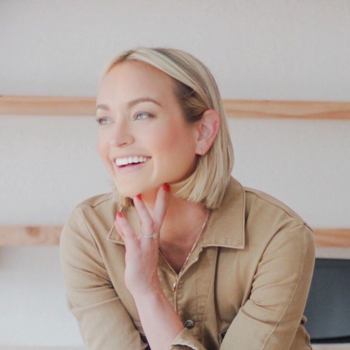 Headshot of Kaleigh Moore, blog contributor with the International Coaching Federation. Known for expertise in sales and AI.  