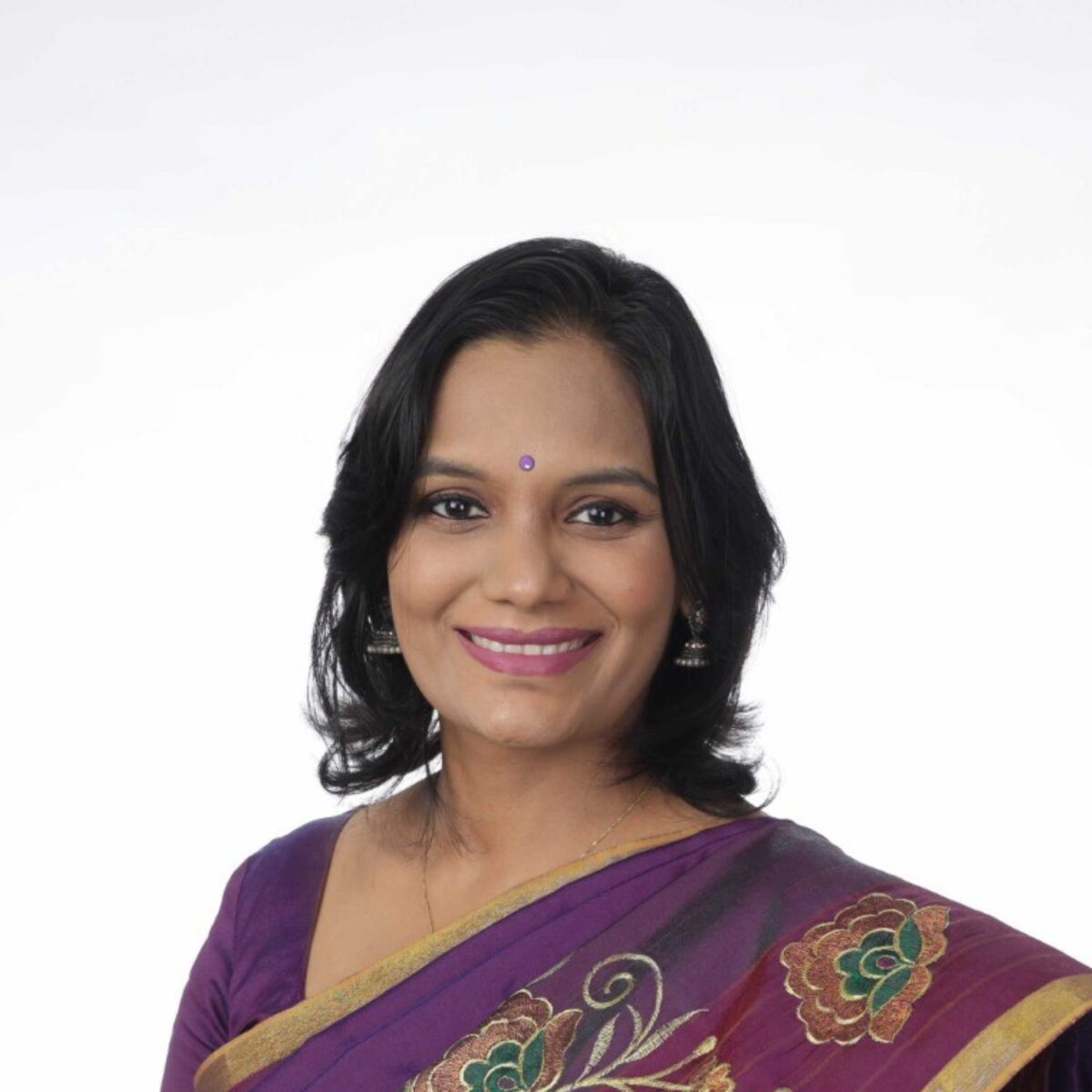 Headshot of Anushly Sithamparam, ACTC, PCC,