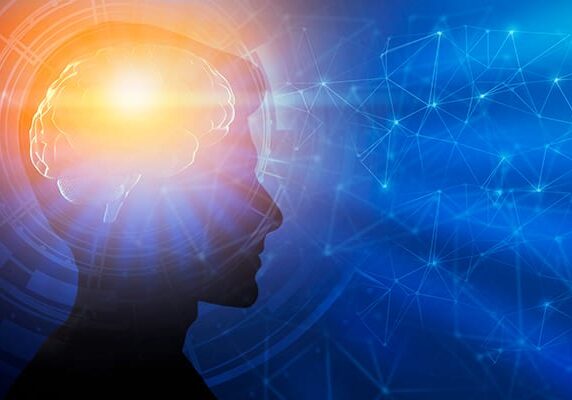 silhouette of a mans head with an over lay of a lighted brain and connected dots