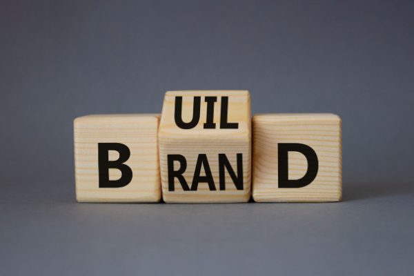 blocks spelling Build Brand