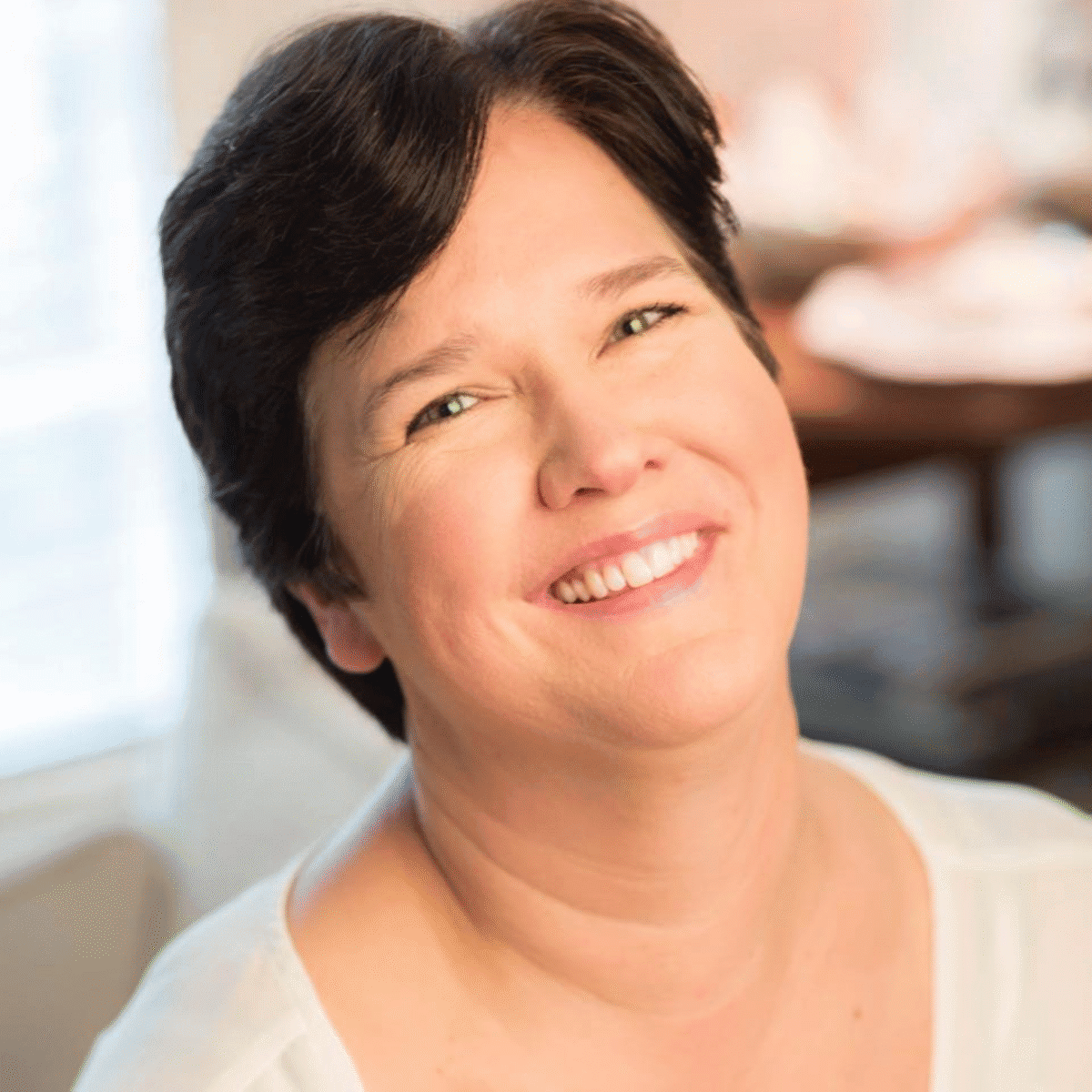 Headshot of Dez Stephens, Founder of Radiant Coaches Academy, Coach Trainer, and Global Ambassador with the International Coaching Federation. Known for her visionary insight and heart-centered leadership.